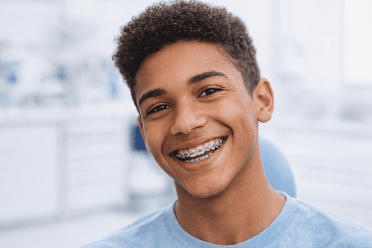 teen patient simling with braces
